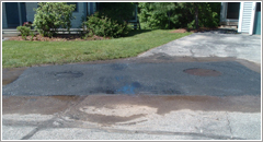 property management pavement repairs, sunken sewer cover repairs