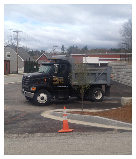 paving trucks at the family owned and operated JDK paving